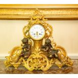 A French ormolu figural mantel clock, circa 1890, the barrel case with 4 inch enamelled dial