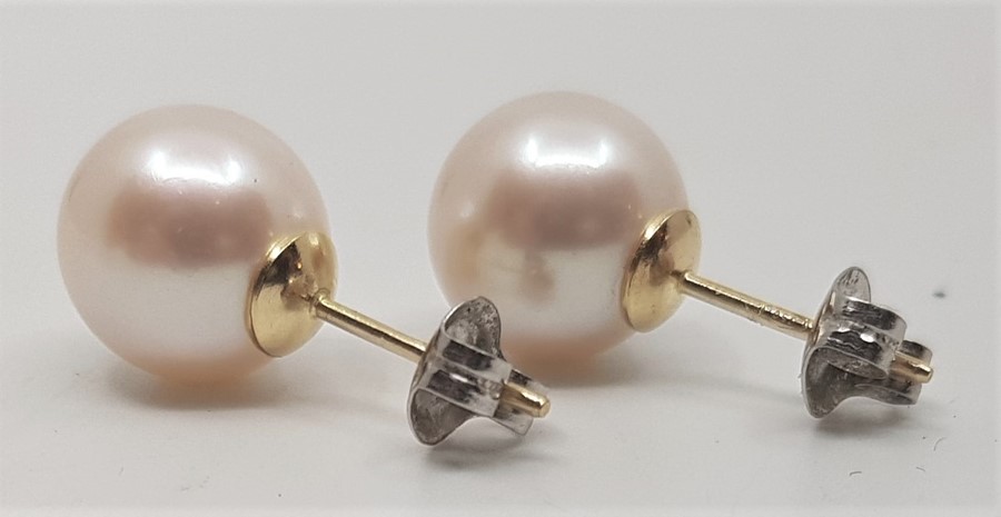 A pair of 18ct. yellow gold, platinum, diamond, cultured and baroque pearl earrings, each having - Image 3 of 3