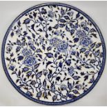 An Islamic intererst  blue, white and gold charger with collectors label verso, diameter: 42.5cm