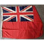 A Red Duster flag, cloth panels, the union Jack approx. 56cm x 103cm, . Condition: Flag with moth