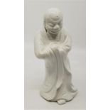A Qing dynasty Blanc de Chine Chinese pottery figure of an elder, Antichita F Genova Venzia label
