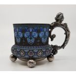 A late 19th century Imperial Russian silver-gilt and polychrome cloisonne enamel tea glass holder,