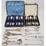 A quantity of silver table and flatware, to include a cased set of six dog nose silver coffee