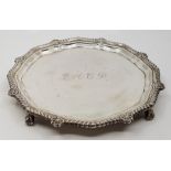 A small silver circular salver, by Cooper Brothers & Sons Ltd, assayed Sheffield 1963, having