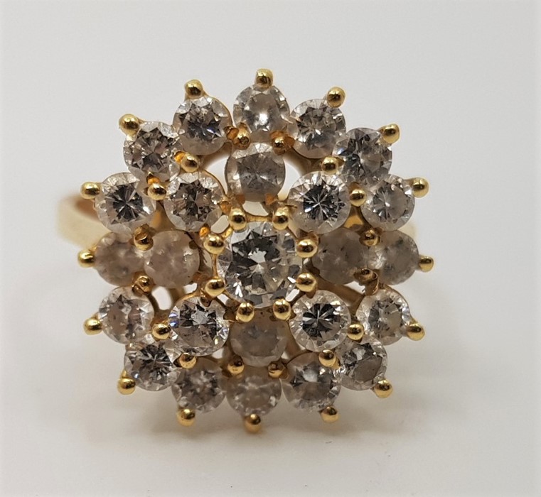 A precious yellow metal and diamond cluster ring, set numerous round cut diamonds, (yellow metal