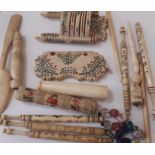 A Collection of various 19th century carved ivory and bone items, including bobbins carved with