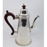 A silver coffee pot, by Garrard & Co Ltd, assayed London 1970, in the George II style, with tapering