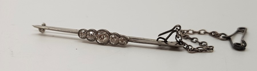 A precious white metal five stone diamond bar brooch, bezel set five graduated old round cut - Image 2 of 2