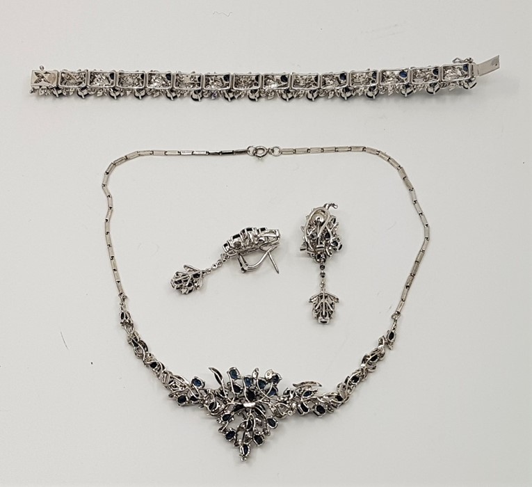 A blue sapphire and diamond fringe choker necklace, bracelet and drop earrings suite, mounted in - Image 5 of 7