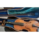 An antique full size violin, labelled Arbeit, together with a Primevara full size violin, with two