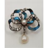 A late Victorian/early Edwardian precious metal, diamond, pearl and enamel pendant/brooch, in the