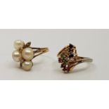 A 14ct. gold and pearl ring, set four cultured pearls and small round cut diamonds, shank stamped "