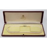 A cultured pearl choker necklace, with clear stone set 9ct. white gold hallmarked clasp, length