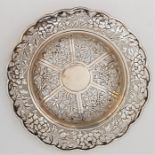 A Chinese export silver circular dish, possibly Wang Hing, with pierced and embossed foiiate