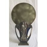 A WMF Art Nouveau polished pewter and brass figural easel stand dressing mirror, cast with a pair of