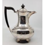 A silver baluster form coffee pot, by Atkin Brothers, assayed Sheffield 1927. height 22.8cm. (