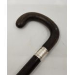 A horn handled walking stick, of greenheart with silver collar assayed Birmingham 1921, height