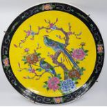 A large 19th cent Meiji period  Japanese charger, yellow ground with bird. Condition good no