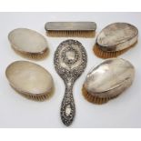 A Victorian silver mounted hand mirror, by James Deakin & Sons, assayed Chester 1899, together