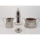 An Edwardian silver sugar caster of octagonal baluster form, by William Hutton & Sons Ltd, assayed