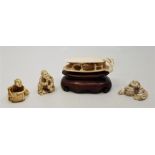 Three Japanese Meiji period carved ivory netsuke, fashioned as various figures, two signed to