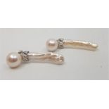 A pair of 18ct. yellow gold, platinum, diamond, cultured and baroque pearl earrings, each having