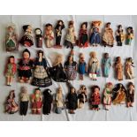 A large collection of dolls, dressed in traditional costume of worldwide countries and cultures. (