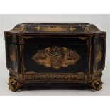 An 18th century Chinese chinoisserie gilded black lacquer tea caddy, raised upon four out swept