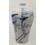 A Chinese late 19th or early 20th century blue and white meiping shape vase, decorated with exotic