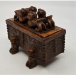 A Chinese carved stone casket and cover, length 13.7cm.
