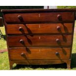 An early 19th cent Chest of drawers of four drawers with original bun handles