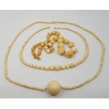 Three Chinese 19th century ivory necklaces. (3)