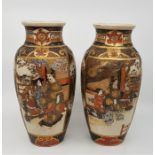 A pair of Japanese Satsuma vases, one as found. (2)