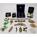 A large collection of vintage and modern costume jewellery. to include numerous stud earrings,