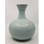 Poh Chap Yeap (1927-2007), a porcelain celadon glaze vase, incised signature to base, height 21.