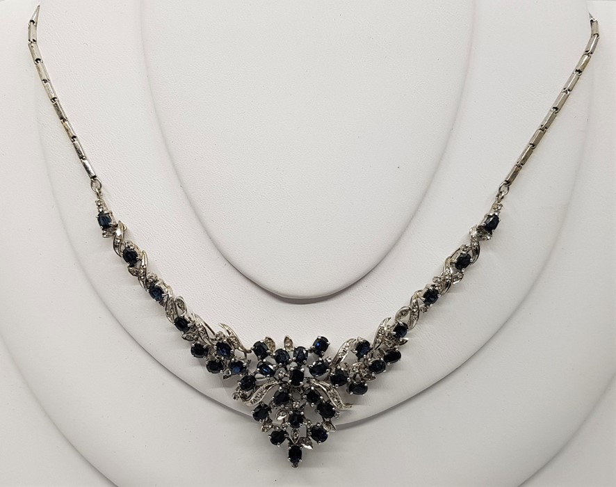 A blue sapphire and diamond fringe choker necklace, bracelet and drop earrings suite, mounted in - Image 2 of 7