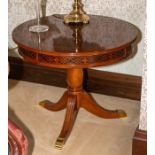 A circular tripod occasional table with blind fret carved frieze, diameter 66cm Note: located at the