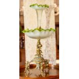A 19th Century green vaseline glass two tier epergne, in a cast metal tripod stand, height 47cm