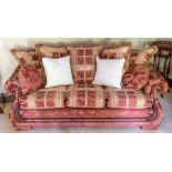 A recent upholstered four piece suite. carved wooden scroll arms, width of the three seater 200cm (