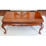 A recent mahogany coffee table, on cabriole legs with claw and ball feet, width 120cm Note: