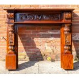 A traditional mahogany fire surround, carved detailing, full size approximately 130cm by 150cm, with