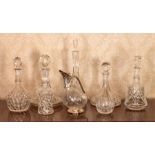 Eight assorted clear cut glass decanters, to include a mallet shape, one with a plated mount etc (8)