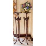 A pair of mahogany tripod jardiniere stands, ring handles, height  136cm (2) Note: located at the