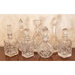 Seven assorted clear cut glass decanters and stoppers (7) Note: located at the vendor's property