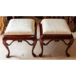 A pair of stools with square upholstered seats, cabriole legs, 48 by 48cm (2) Note: located at the