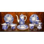 A Royal Crown Derby coffee set, blue transfer design of a Chinaman beside a balustrade, comprising