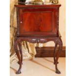 A pair of mahogany bedside tables, single cupboards, on cabriole legs, height 80cm (2) Note: located