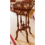 A mahogany jardiniere stand with square spindle gallery top, height 88cm Note: located at the