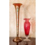 A mid 19th Century Bohemian ruby cased glass trumpet vase, circa 1860, floral and gilt decoration,