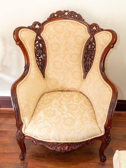 A pair of recent wing back armchairs, damask upholstery, carved lovebirds to the top rails (2) Note: - Image 2 of 4